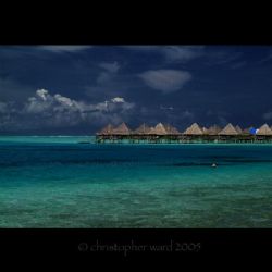 Bora Bora, French Polynesia. Stilt huts, 87 degree water,... by Christopher Ward 